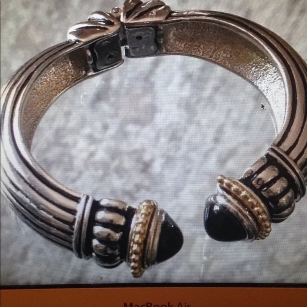 metal bracelet with black cabachons